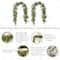 Glitzhome® 6ft Christmas Greenery PE Cedar Garland with Red Berries, 2ct.